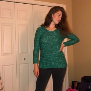 green knitted sweater